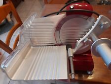 trancheuse à jambon semi professionnel marque italienne rouge et métal peu servi