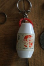 Ancien porte cle publicitaire