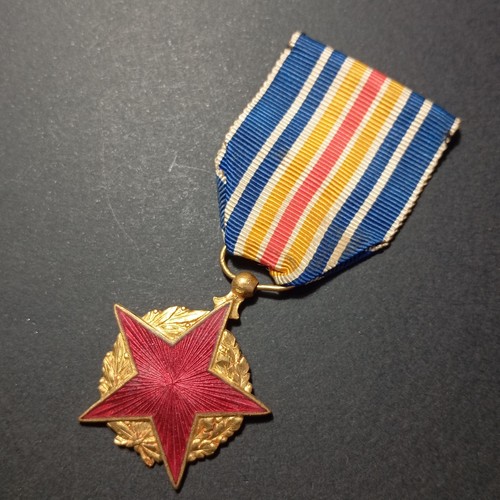 Médaille - q8/03/26,