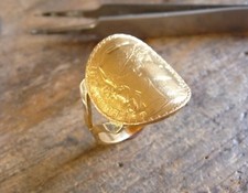 Bague pièce or cintrée