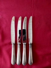 4 Couteaux de table métal argenté Orfevre deetjen  modèle Coquille 