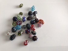 Lot de 29 perles en verre de