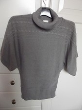 Pull forme chauve-souris col