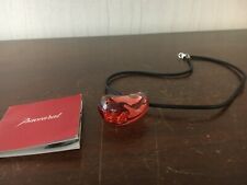 Collier pendentif galet rose en cristal de Baccarat