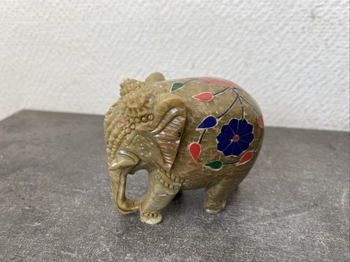 Petite figurine pierre - en,