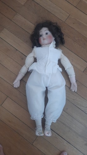 Poupee jumeau bouche fermée