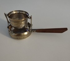 Passoire à thé ancienne en métal argenté et doré