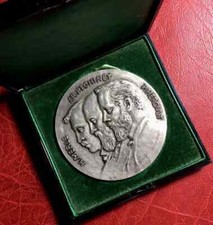 Art Déco 100 anniversaire de PECHINEY Zeus nu en ciel médaille Paul Belmondo