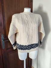 Pull à torsades et jacquard