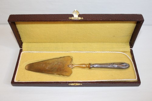 Pelle tarte manche argent - à,
