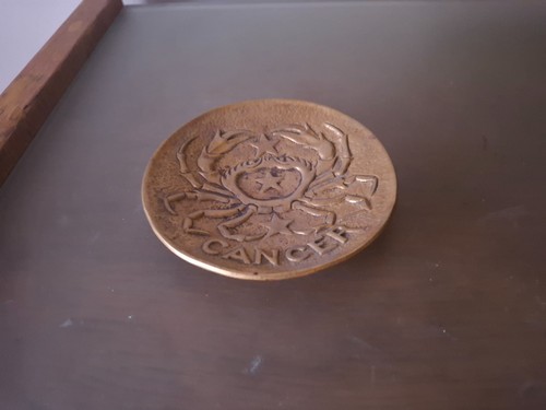 Vide poche bronze - en, signe