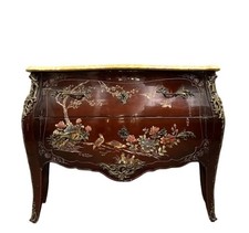 Commode sauteuse galbée en