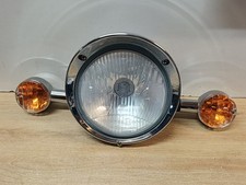 UN OPTIQUE DE FEU PHARE AVANT
