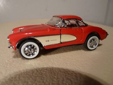Modèle réduit CHEVROLET CORVETTE STING RAY 1957 de marque FRANKLIN MINT au 1/43