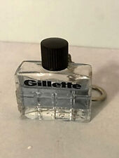 Ancien Porte-clé GILLETTE avec son flacon contenant encore de l'after shave