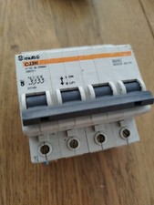 MERLIN GERIN DISJONCTEUR SECTIONNEUR C32N 4 poles 10A TETRA 20144 No 12 U (10A)