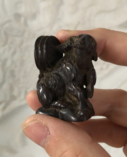 Curieuse petite sculpture - curieuse,