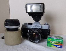 CANON TLB Objectif FD 50mm f1.8 S.C + doubleur Komura + Flash + Pellicule + Sac