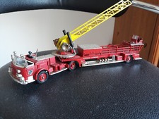 1:50  Camion de Pompier AMERICAN LAFRANCE Rouge (T.B.E.) avec grande échelle
