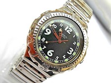 SWATCH IRONY SUISSE,MODEL AG1995 BOMBE,LUNETTE  ROTATIF A CLIC,BEG & FONCTIONS