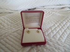 boucle d'oreille fleur centre