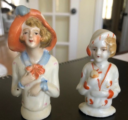 Two antique bisque half dolls - two,