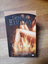 Livre - LAURELL K. HAMILTON--OFFRANDE BRULEE anita blake T7--Edition MILADY poch