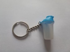 Porte clés Récipient doseur