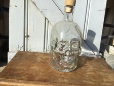Bouteille en verre tête de mort crane original transparent