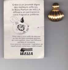 Pin's Bijou métal doré - Collection Wella