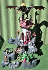 Gros lot playmobil : donjon du dragon + grand dragon noir + dragon vert