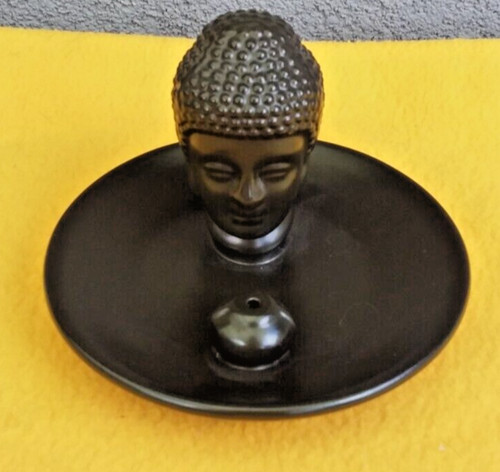 Figurine bouddha brûle