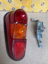 RENAULT  R4 4L - FEU ARRIERE GAUCHE SEIMA 605 G  COMPLET NEUF cabochon + socle