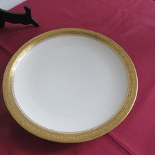 1 plat rond en porcelaine