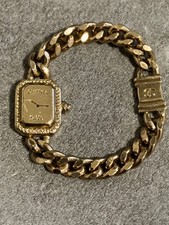 Breloque ou bague Chanel en métal doré