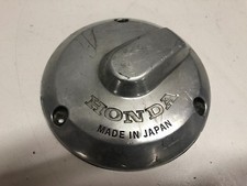 UN COUVERCLE CARTER ALLUMAGE