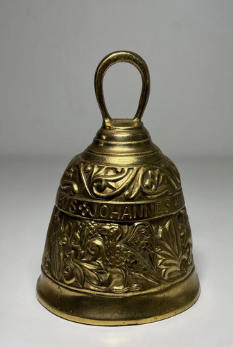 Cloche bronze décorée - en,
