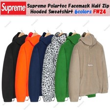 Sweat à capuche demi-zip