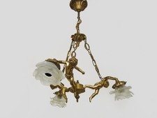 Superbe lustre chérubin à 3 lumières tulipe en forme de rose. Années 60