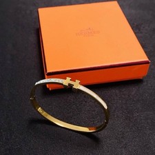 HERMÈS Gold Metal Bangle