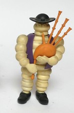 Ancienne Figurine Michelin Bibendum - Joueur de Cornemuse - Gilet Violet
