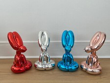 Set of 4 Sitting Rabbits