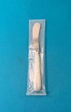 NEUF couteau à beurre