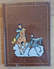 ROMBALDI TUNIQUES BLEUES INTEGRALE  tome 1 BD  ETAT NEUF sous blister