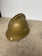 Ancien casque de pompier en cuivre quelque bosse dans son jus en laiton