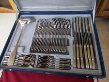 Ménagère en inox mat, 49 pièces, de marque LETANG REMY PARIS, et son écrin.