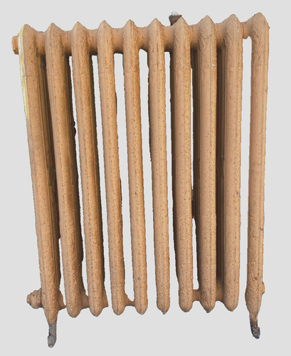 Radiateur ancien sur - , pieds