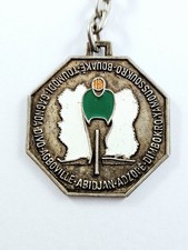 PORTE-CLES - TOUR CYCLISTE de CÔTE d'IVOIRE 1962 - Métal Peint - Vintage -
