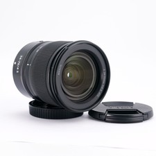 Nikon Nikkor Z 24-70 mm f/4 S lens with original caps and hood