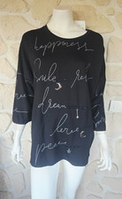 Haut noir et gris marque Pomme